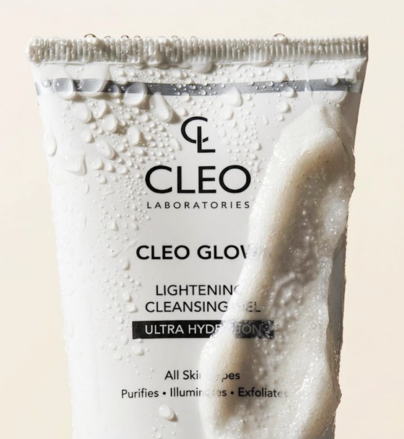 Model holding Cleo Glow hyaluronic acid eye contour cream